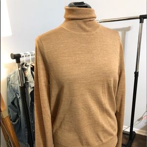Camel turtleneck.